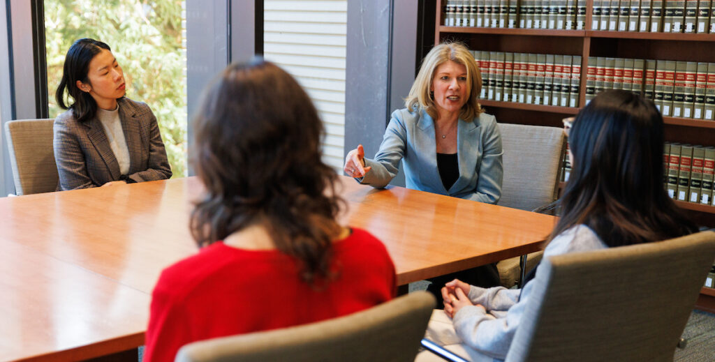 Nora Freeman Engstrom in a conference room at Stanford Law School